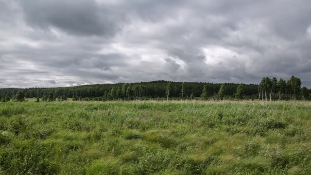 Field and clouds, time lapse, cam4