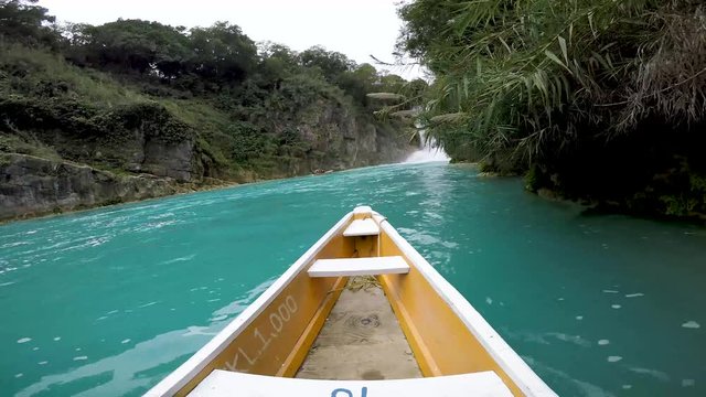 yellow boat point of view (EL SALTO-EL MECO) blue river water and boating