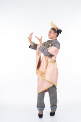 A beautiful Malaysian traditional female dancer performing the dance steps of a cultural dance routine called Tarian Inang in a traditional dance outfit. Full length isolated in white.