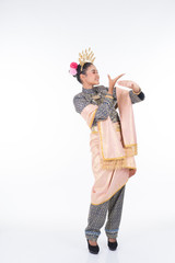 A beautiful Malaysian traditional female dancer performing the dance steps of a cultural dance routine called Tarian Inang in a traditional dance outfit. Full length isolated in white.