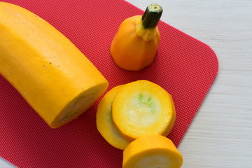 Natural, whole and chopped yellow zucchini