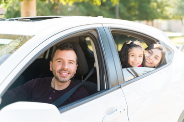 Happy Family In Vehicle During Weekend