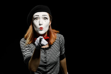 Woman points a finger at you and piercing