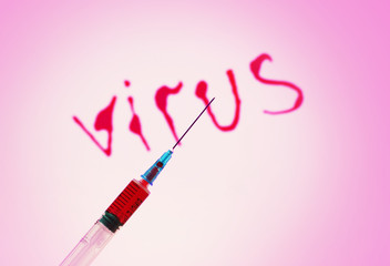 Syringe with a blood sample, abstract background. Inscription on the background - virus. Virus epidemic, medical concept.
