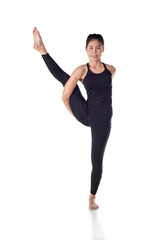 Young attractive girl practicing yoga isolated on white background. Concept of healthy life and natural balance between body and mental development., with clipping path