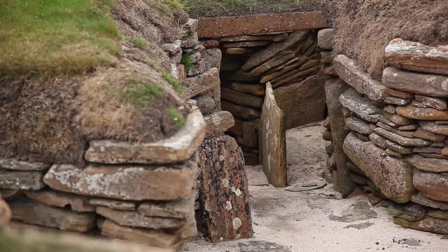 This is a view of a wall section at Skara Brae showing the tightly packed stone construction of the dwellings.