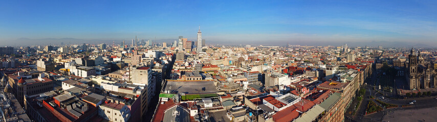 Obraz premium Historic center of Mexico City with CBD skyline on Avenue Paseo de la Reforma aerial view at Zocalo, Mexico City CDMX, Mexico. Historic center of Mexico City is a UNESCO World Heritage Site.
