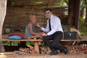 Parkinson disease patient, elderly senior person in support of nursing family caregiver for disability awareness day, senior citizens aging society concept
