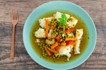 baked rice with mixed veggies and vegetable broth