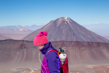 Woman on a volcano with oxygen