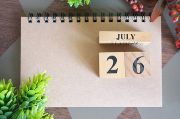 July 26, Appointment date with number cube design for background.