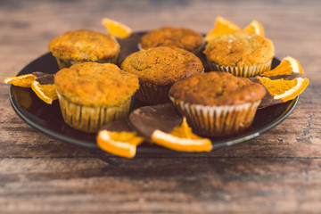 vegan banana muffins with dark chocolate covered orange slices