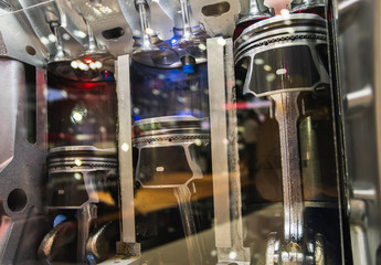 Close up shot of open engine pistons , Metallic background of the internal combustion engine.