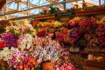 Fototapeta na wymiar fake flowers in flower shop Beautiful colors