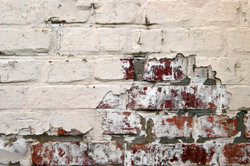 Old Grunge Red brick With Peeled white Plaster.
