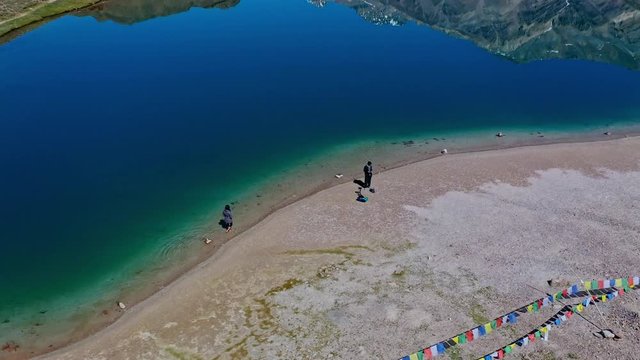 Aerial tilting shot of chandratal lake , spiti valley.