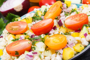 Fresh salad with bulgur groats and vegetables. Healthy lifestyles and nutrition