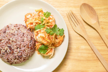 Shrimp with garlic pepper and cooked jasmine rice.