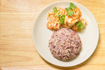 Shrimp with garlic pepper and cooked jasmine rice.