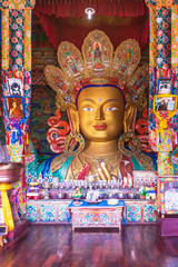 Fototapeta premium The statue of Maitreya Buddha (future Buddha) at Thiksay Monastery Leh,Jammu and Kashmir, Ladakh, India. The largest Buddha statue in the monastery. One of the main points of Monastery.