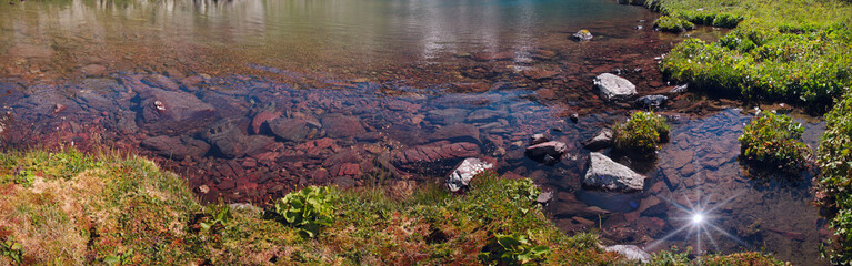 Fototapeta na wymiar Mountain lake, panorama landscape, sun reflection in the water, natural background, Altai