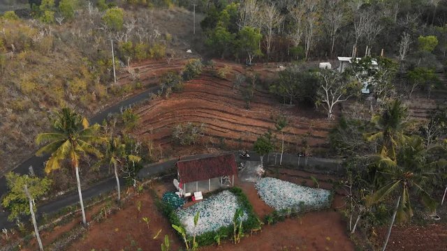 AERIAL: Flying over a Rubbish/ Plastic Collectors Place Nusa Penida Bali 4K