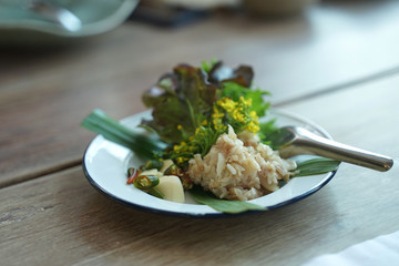 Fermented Pork Spicy Salad northern style serving with fresh chili and Lettuce on white plate