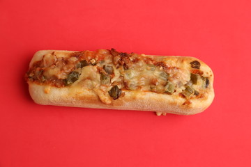 hot dog with cheese and pepper