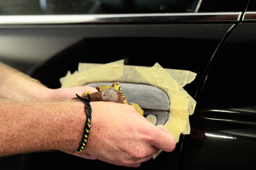 Obraz premium Repair of the door car handle