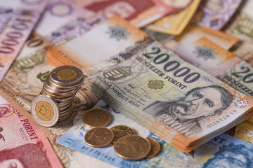Forint Coins Hungarian currency, in the background banknotes of different denominations. Európe Hungary
