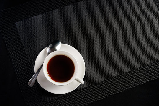 Cup Of Coffee And Cookies On A Black Background Shot From Above With Space For Text.