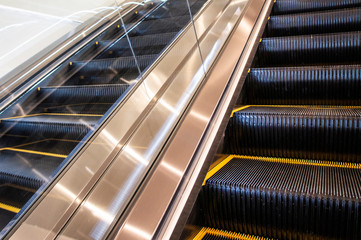 Obraz premium Beautiful new escalator without people in the mall close-up. Minsk Belarus 02 February 2020