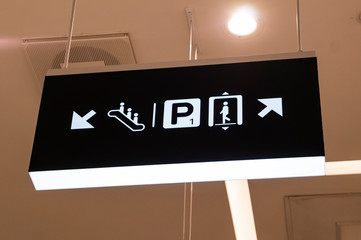 Signs icons directions symbols in the mall. Toilets arrows pointers for the disabled. Minsk Belarus 02 February 2020