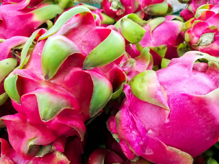 Closeup lots of dragon fruit sell in supermarket.