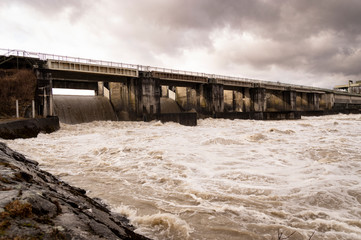 Fototapeta na wymiar Dam at the river inn after heavy railfall