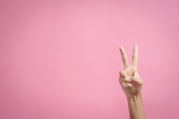 Pictures of people who can't remember gestures, gestures showing approval or agreement, gestures through pink background. Body language concepts like gestures.