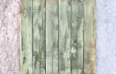 Naklejka premium Worn wood texture with old peeling paint. Vintage graffiti background, cracked wood texture. Clipart, beautiful cracks on the surface of the table or wall, old boards.