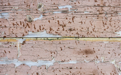 Worn wood texture with old peeling paint. Vintage graffiti background, cracked wood texture. ...