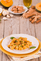 Pumpkin gnocchi with grated amaretti cookies.