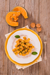 Pumpkin gnocchi with grated amaretti cookies.