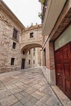 Cathedral arch Barchilla street in Valencia, Spain