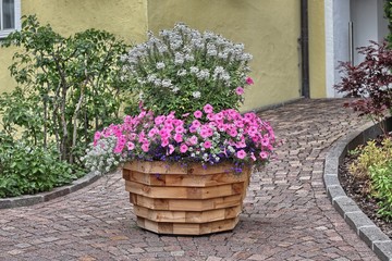 Decorative wooden planter with flowers