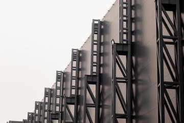 Naklejka premium metal structures on the wall of a shopping center