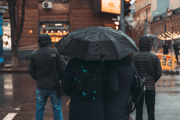 man with umbrella in the rain