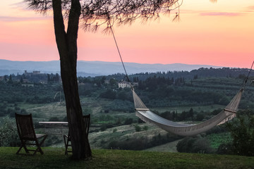 Fototapeta premium This photo was taken in Toscana, near the town of Poggibonsi, in the courtyard of a very cozy and welcoming hotel. I hope that someday I will return here to enjoy the warm Tuscan evenings.