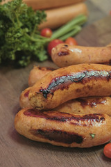 Raw grilled sausages with meat (beef, pork, lamb) and spices, hot merguez, kabanos, chorizo.