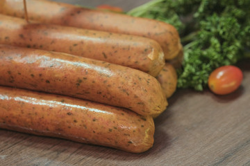 Raw grilled sausages with meat (beef, pork, lamb) and spices, hot merguez, kabanos, chorizo.