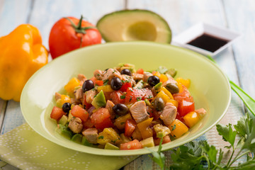 salmon salad with capsicum avocado tolatoes and soya sauce