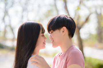 LGBT Asian woman young lesbian lovers kissing on Valentine's Day