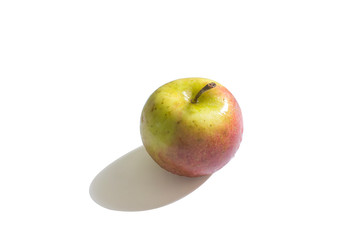 Semi red apple on white background